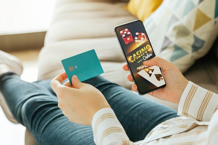 Antarmuka aplikasi mobile tuan88 menampilkan pasar sportsbook dan studio dealer langsung